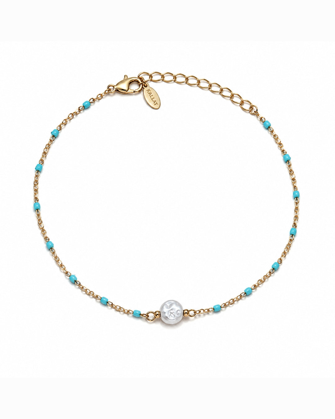 A delicate gold chain bracelet with small turquoise blue beads and a central round silver-toned charm, displayed on a clean white background.