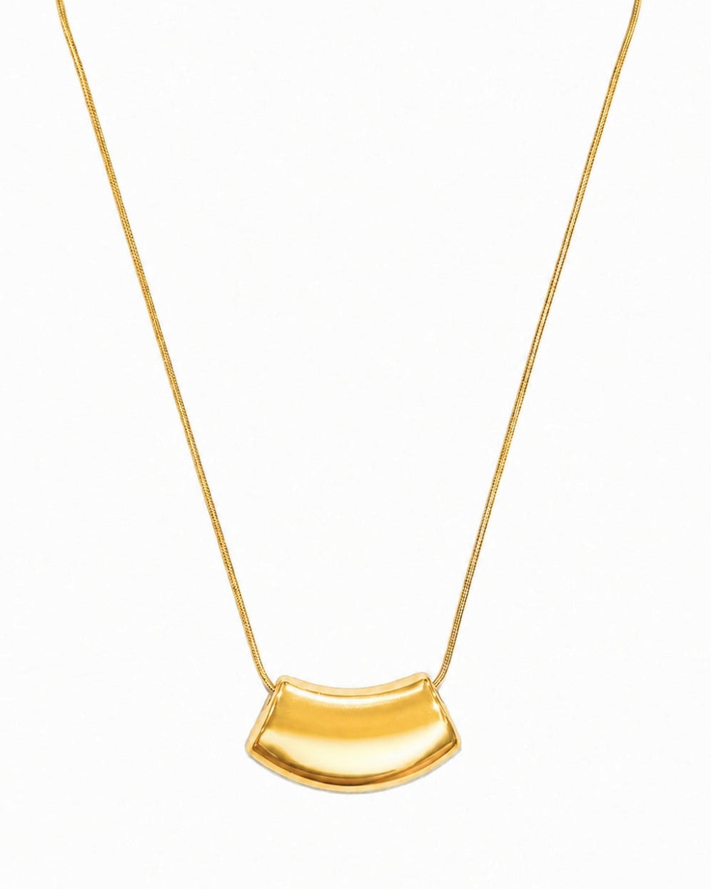 A gold necklace featuring a curved, semi-circular pendant on a delicate gold chain, presented against a plain white background.
