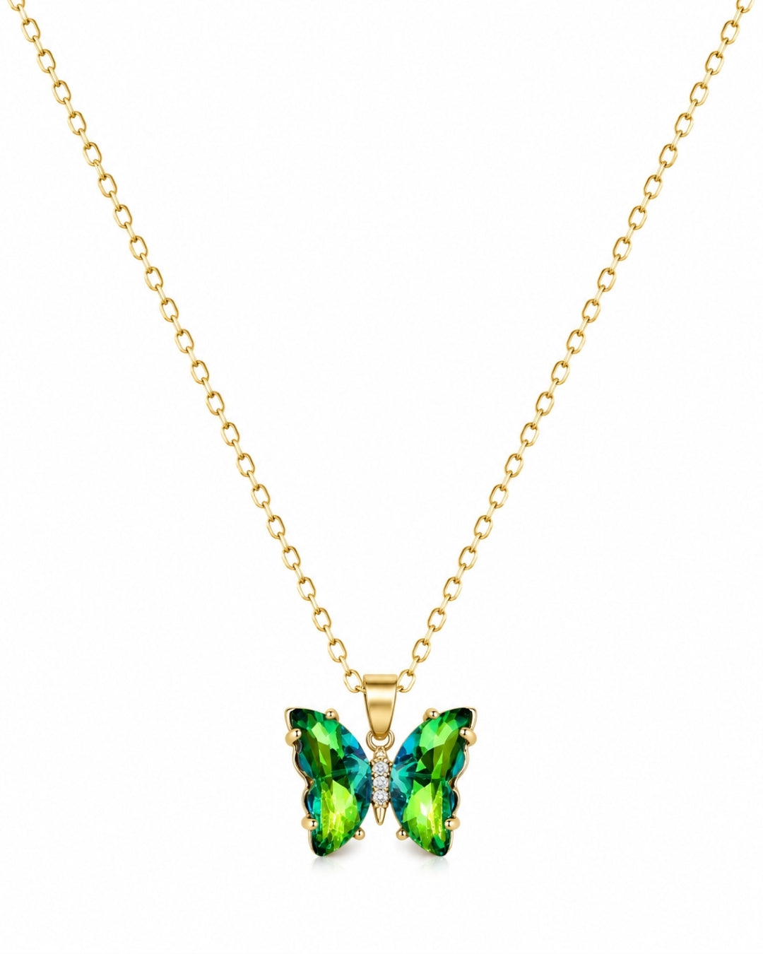 A gold chain necklace with a butterfly-shaped pendant featuring green and blue iridescent gemstones, set against a plain white background.