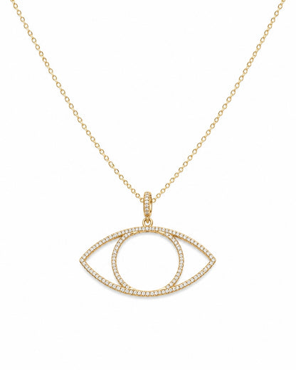 A gold necklace featuring an open eye pendant paved with small clear stones, shown against a plain white background.