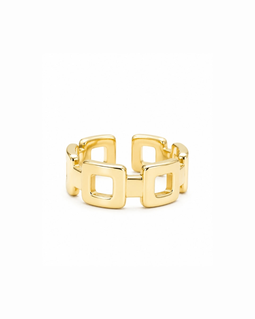 A gold geometric ring with a wide band composed of interlocking square links, shown on a plain white background.