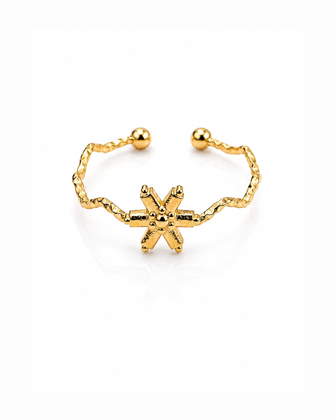 A gold-toned open cuff ring featuring a textured twisted chain band, small round bead ends, and a central six-pointed star charm, shown on a clean white background.