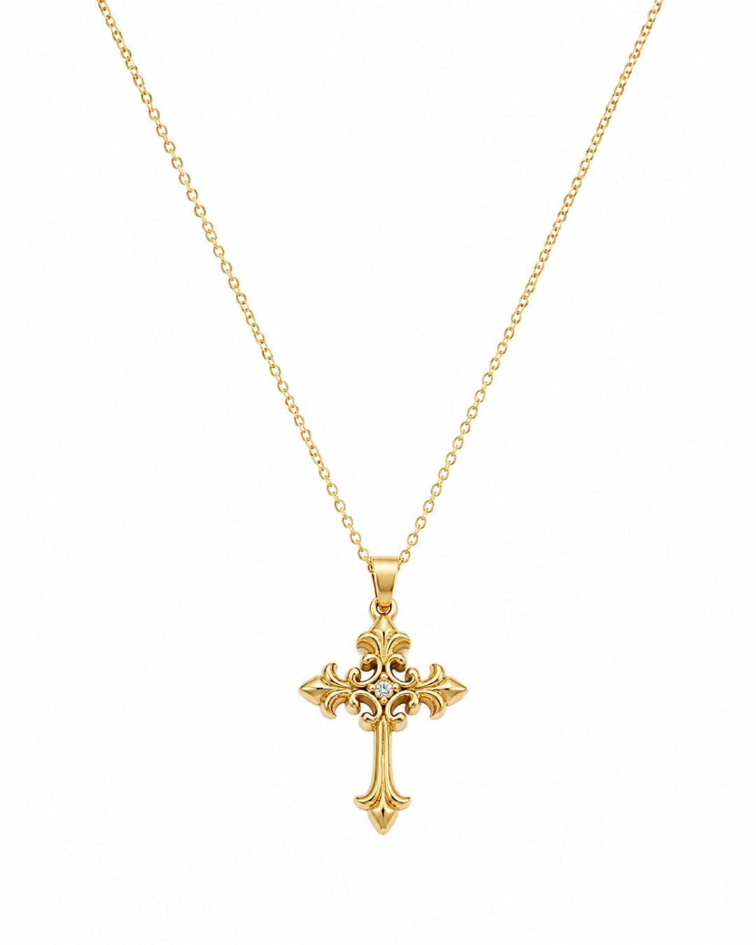 A gold cross pendant necklace with a delicate chain, shown against a plain white background.