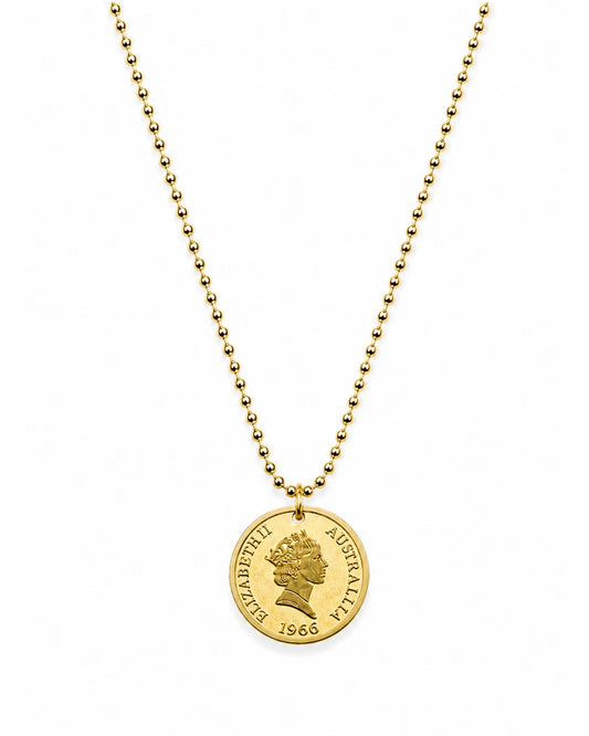 A gold ball-chain necklace featuring a circular pendant styled like a vintage Australian 1966 Queen Elizabeth II coin, shown against a plain white background.