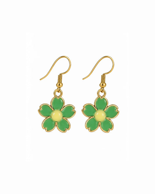 A pair of gold-tone dangle earrings featuring five green enamel flower petals with a pale yellow center, suspended from gold fishhook wires on a plain white background.