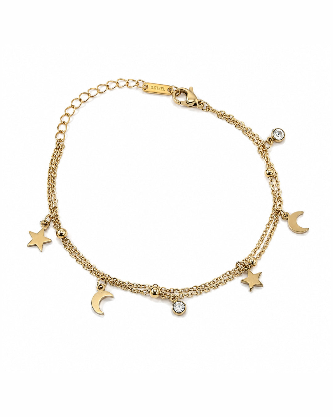 A delicate gold chain bracelet with five small white pearls and tiny gold beads, displayed on a white marble tray.