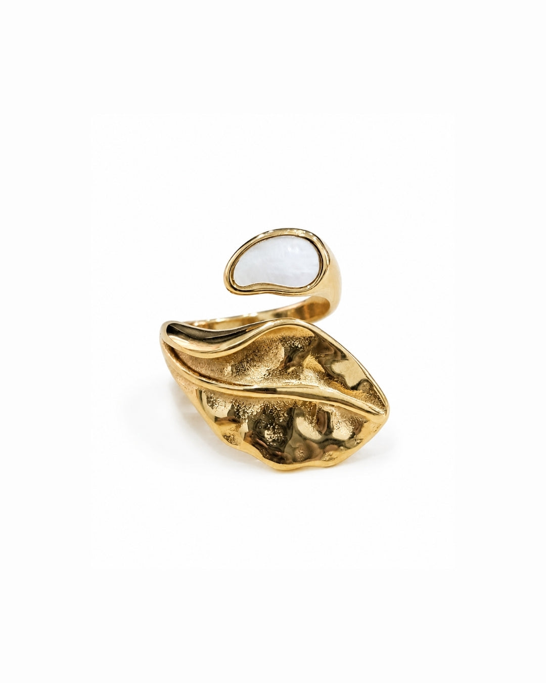 A gold leaf-shaped ring with a smooth white inlay on the top curve, photographed on a clean white background.