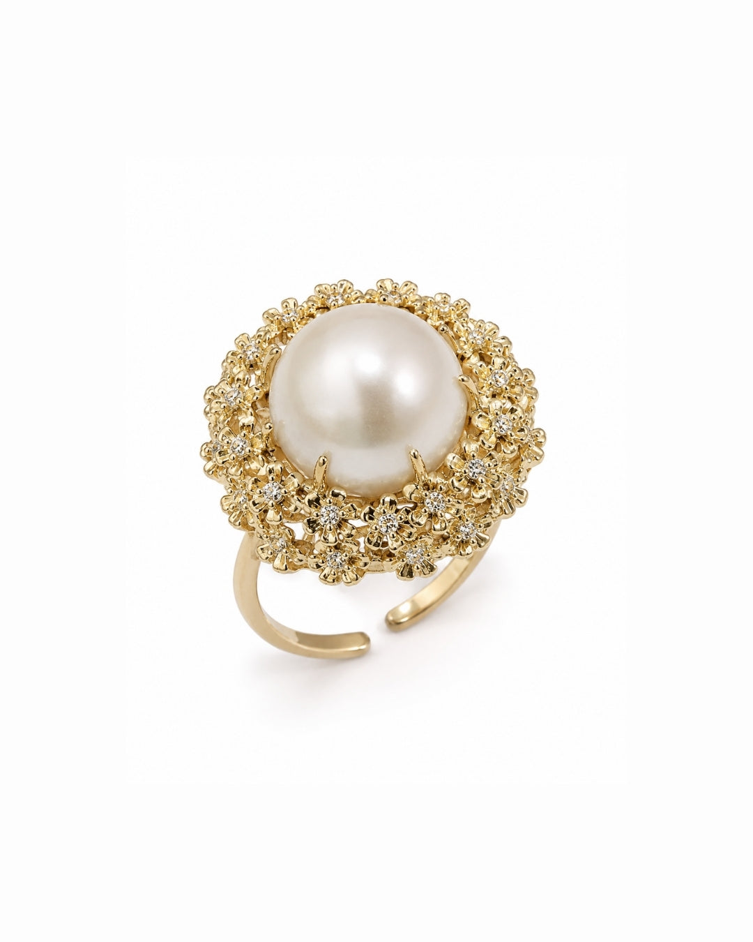 A gold-plated open-shank ring featuring a large, round white pearl surrounded by a halo of small clear crystals, set against a plain white background.