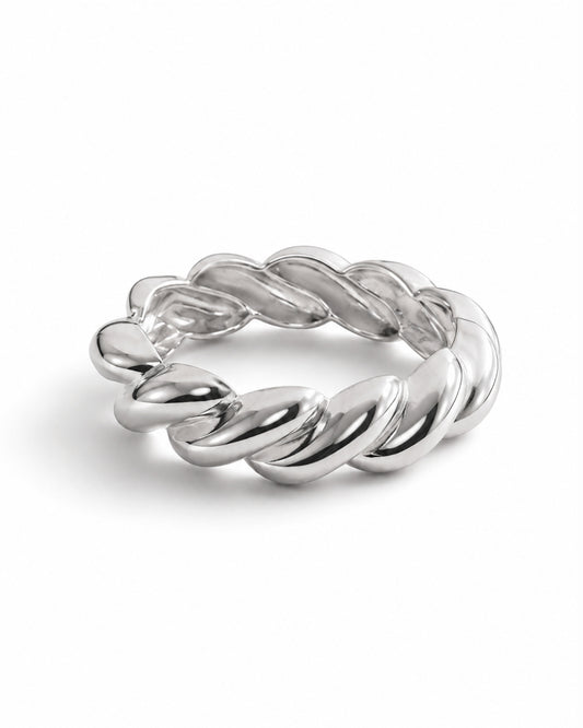 A polished silver twisted rope ring band, photographed on a clean white background with a soft shadow.