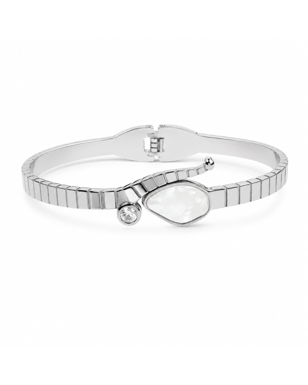 A silver-toned bangle bracelet featuring a segmented, ribbed design, a large irregular teardrop-shaped clear stone, and a small round clear accent stone, shown on a plain white background.