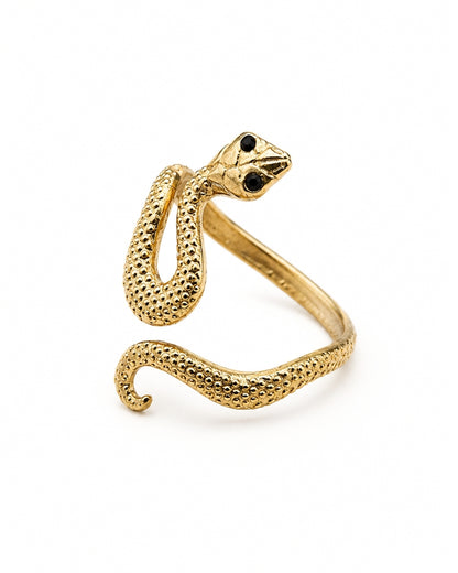 A gold snake wrap ring with textured scales and small black eyes, photographed on a clean white background.